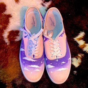 Light pink custom painted shoes that are waterproof, washable, and stylish.